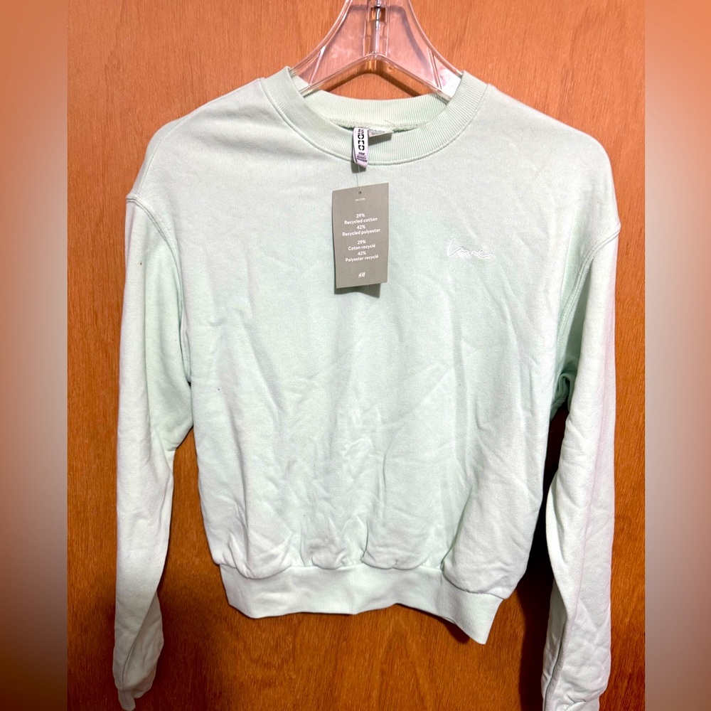 H&M “Love” sweatshirt
